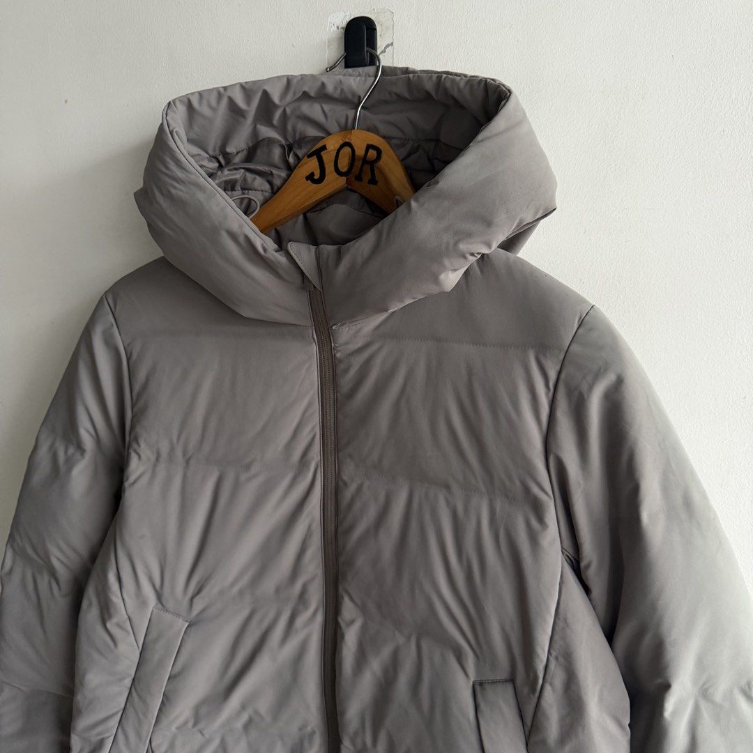 Uniqlo Seamless Down Parka Jacket (Category: Coats, Jackets and Outerwear) located in San Fernando. Submitted by jorjorr (Listing ID 1461992308, Image 3). Description: Uniqlo Seamless Down Parka Jacket Original 💯 Unisex Medium on tag 21.5 width 25 length Excellent to new condition No issue Color may vary due to lighting P1,999.