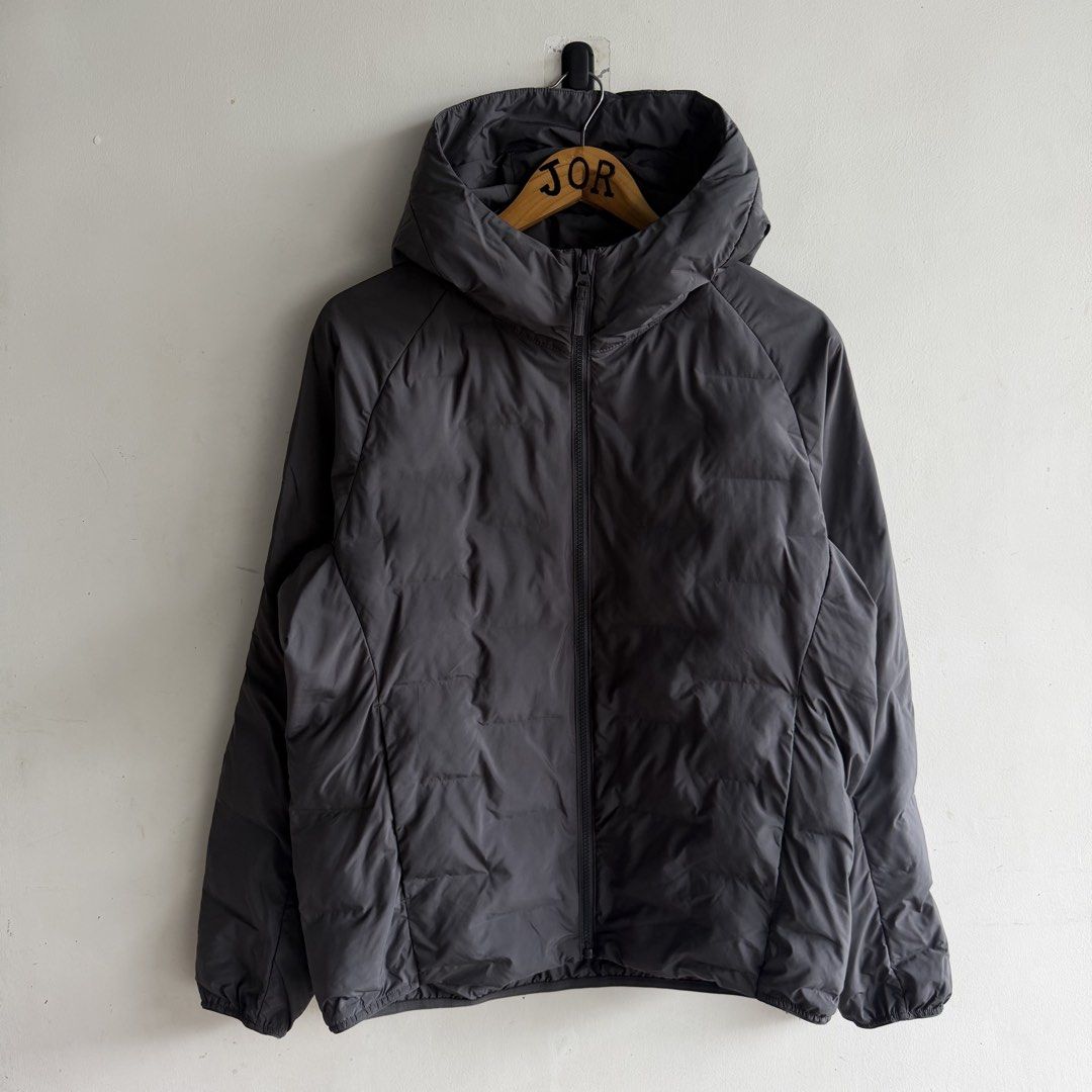 Uniqlo Warm Padded Jacket (Category: Coats, Jackets and Outerwear) located in San Fernando. Submitted by jorjorr (Listing ID 1461872276, Image 1). Description: Uniqlo Warm Padded Puffer Jacket Original 💯 Gray color Large on tag 24 width 27 length Excellent condition to new condition No issue Color may vary due to lighting P1,499.