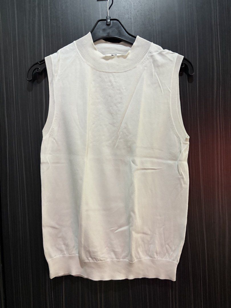 Uniqlo white sleeveless (Category: Blouses) located in Manila. Submitted by thekidshop (Listing ID 1461930115, Image 1). Description: .
