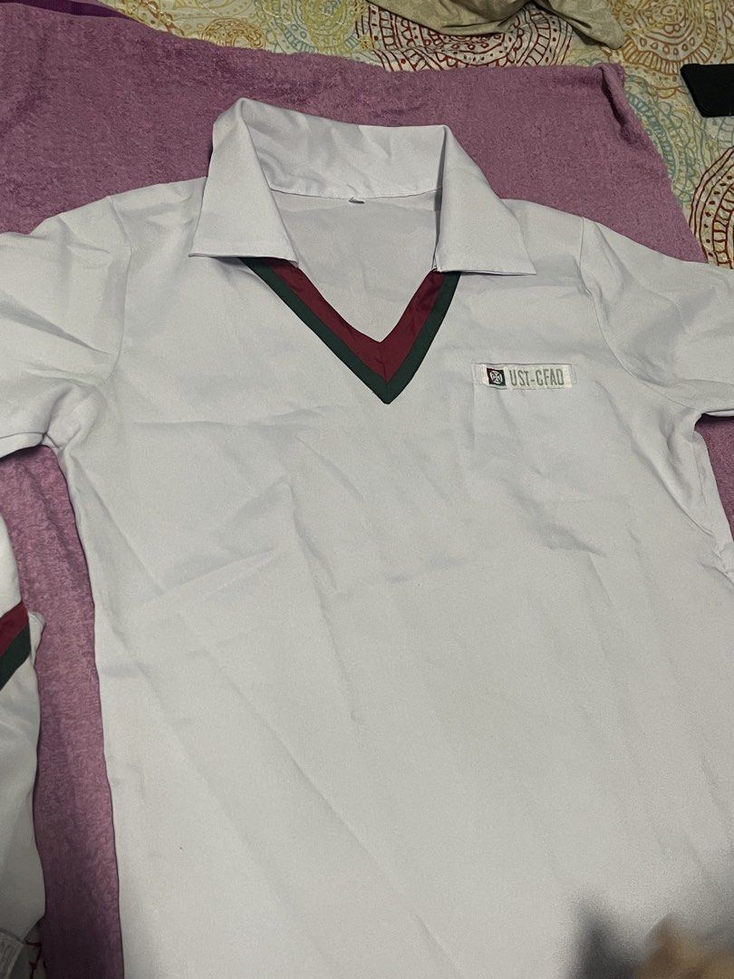 UST CFAD Women’s Type A Uniform (SMALL & MEDIUM) (Category: Shirts) located in Quezon City. Submitted by persehauls (Listing ID 1461909194, Image 1). Description: - (SMALL) have ONE (1) pc! 350 php. was bought at orig price mismo sa ust for 550 pesos. - (MEDIUM) have ONE (1) pc! 400 php. was also bought at orig price for 575 pesos. - RFS: shifted schools + will never wear it again + sayang nakatambak lang here - these type A uniforms were only us