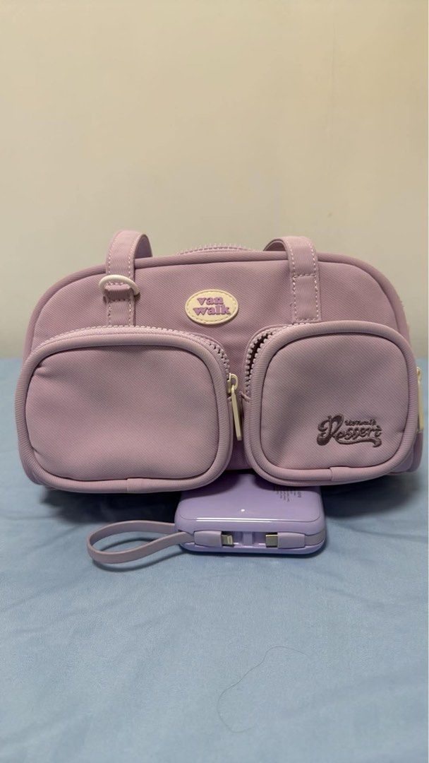 Van Walk Lavender Shoulder Bag with Front Pockets (Category: Shoulder Bags) located in Manila. Submitted by nayeoniescart (Listing ID 1462000037, Image 1). Description: Lavender shoulder bag from Van Walk (USED AND STILL IN GOOD CONDITION) — negotiable Mop: gcash / maribank Mod: jnt / lalamove - with dust bag - Two front zippered pockets. - Main compartment for storage. - Textured fabric with a nice feel. .
