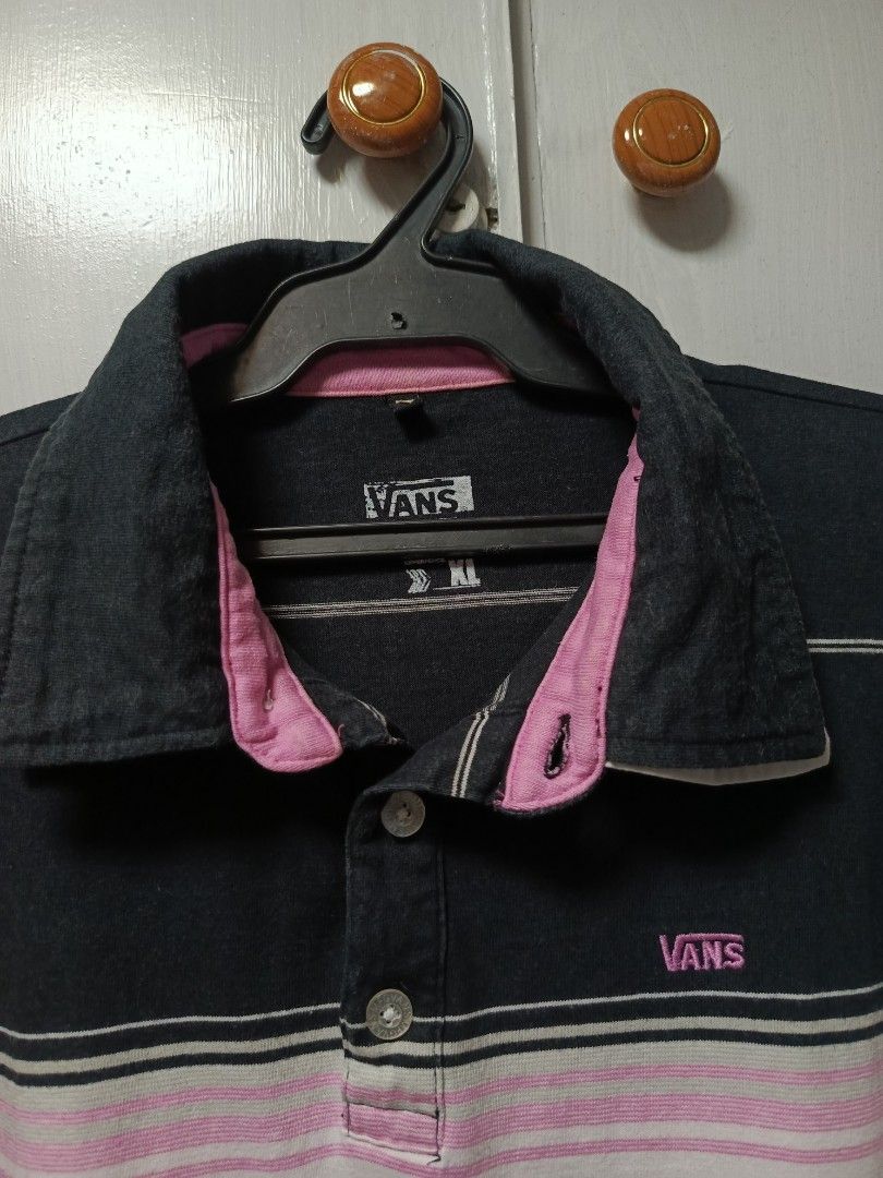 Vans Striped Polo Shirt XL (Category: Tshirts & Polo Shirts ) located in Cabatuan. Submitted by penthegreat (Listing ID 1461961523, Image 2). Description: 21 width & 28 length 9/10 condition and color rate no issue like pinhole or stain - Vans Polo Shirt - Size: XL - Color: Horizontal stripes (Black, White, Pink) - Features: Classic collar, button closure, short sleeves, split hem - Style: Casual wear.