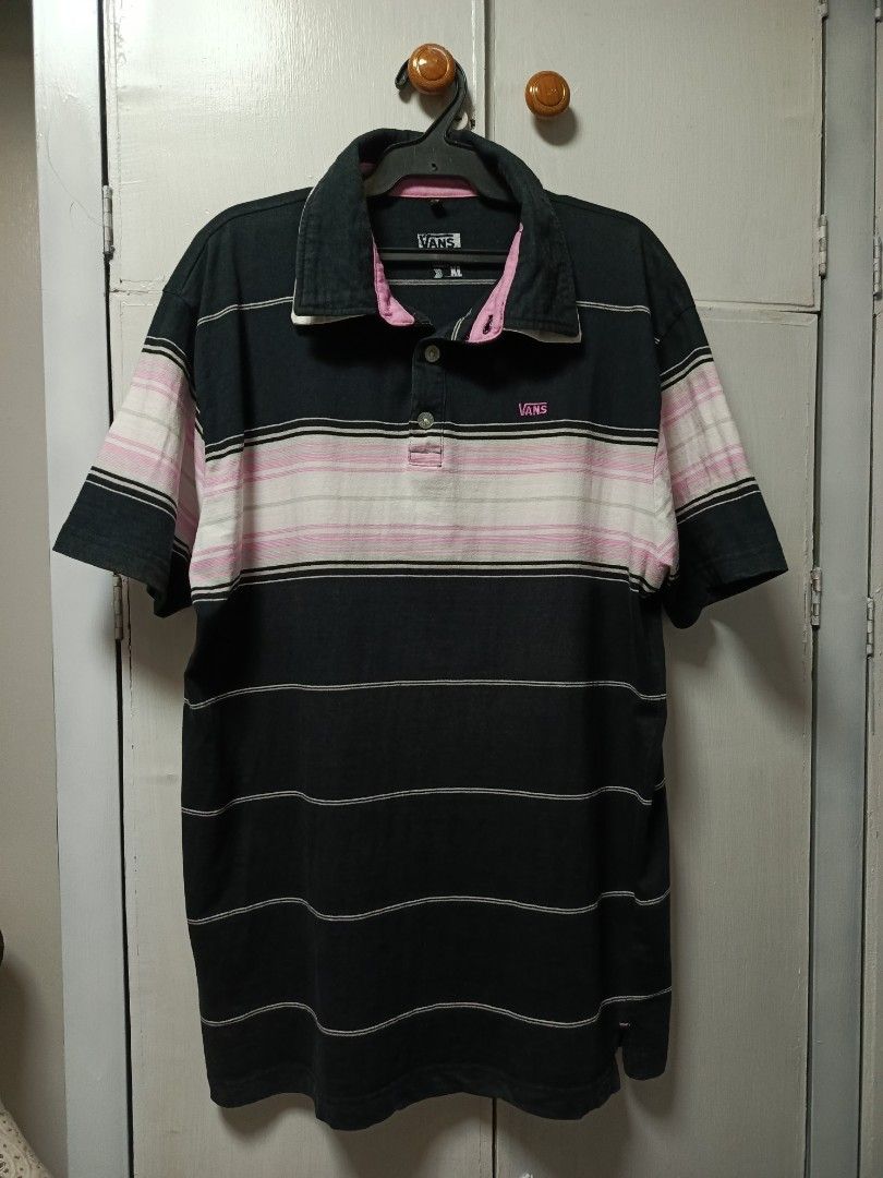 Vans Striped Polo Shirt XL (Category: Tshirts & Polo Shirts ) located in Cabatuan. Submitted by penthegreat (Listing ID 1461961523, Image 1). Description: 21 width & 28 length 9/10 condition and color rate no issue like pinhole or stain - Vans Polo Shirt - Size: XL - Color: Horizontal stripes (Black, White, Pink) - Features: Classic collar, button closure, short sleeves, split hem - Style: Casual wear.