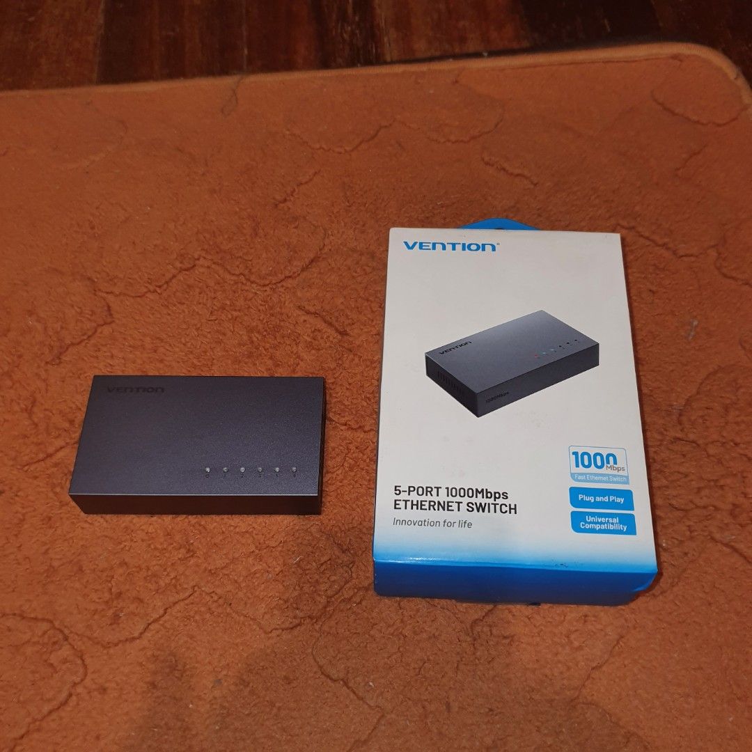 Vention 5-Port 1000Mbps Gigabit Ethernet Switch tp link (Category: Cables & Adaptors) located in Pasig City. Submitted by mr.bargaindeal (Listing ID 1461798648, Image 2). Description: - Vention 5-Port Gigabit Ethernet Switch - Supports blazing-fast 1000Mbps speeds - Simple plug-and-play installation (no drivers required) - Universally compatible with your devices - Perfect for expanding your wired network - Compact and space-saving design.