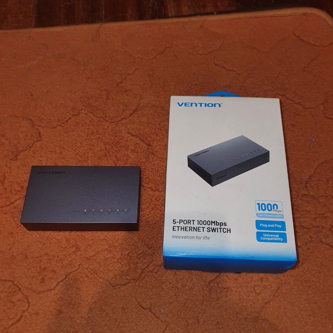 Vention 5-Port 1000Mbps Gigabit Ethernet Switch tp link (Category: Cables & Adaptors) located in Pasig City. Submitted by mr.bargaindeal (Listing ID 1461798648, Image 3). Description: - Vention 5-Port Gigabit Ethernet Switch - Supports blazing-fast 1000Mbps speeds - Simple plug-and-play installation (no drivers required) - Universally compatible with your devices - Perfect for expanding your wired network - Compact and space-saving design.