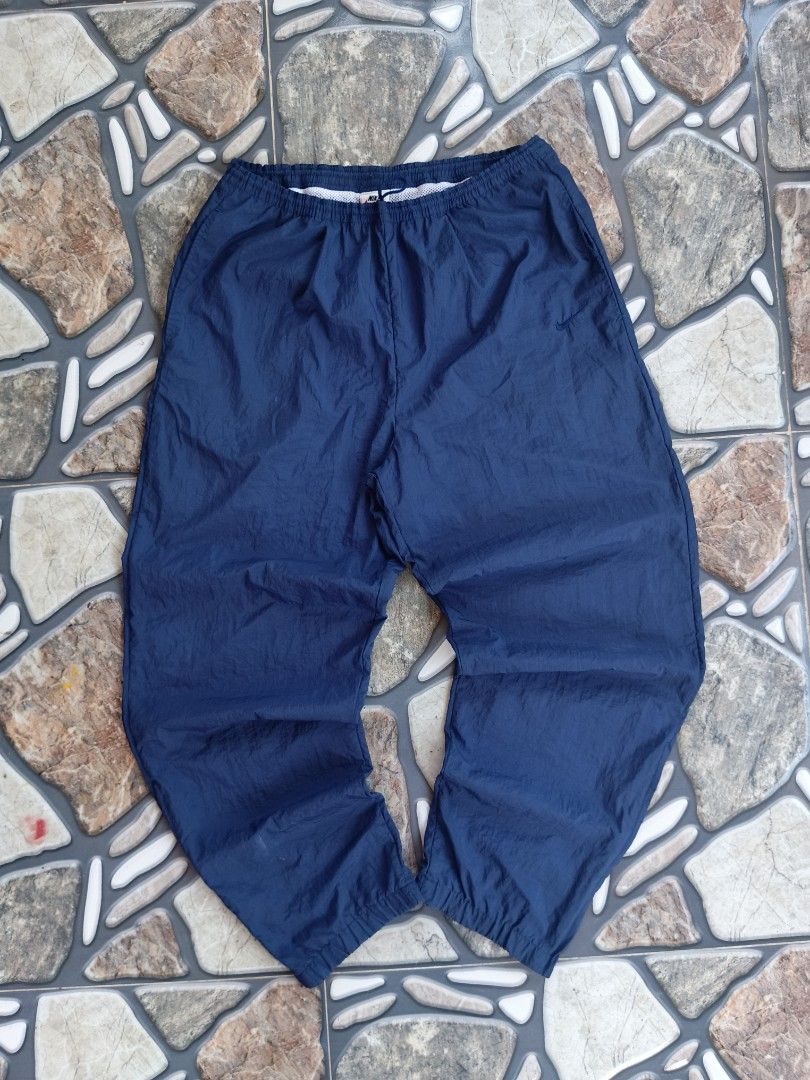 Vintage 1900s nike track pants (Category: Joggers) located in Baggao. Submitted by thriftislife123 (Listing ID 1461935158, Image 2). Description: w:freewaist l:43 hem:7 issue:none off/legit pm for more details.
