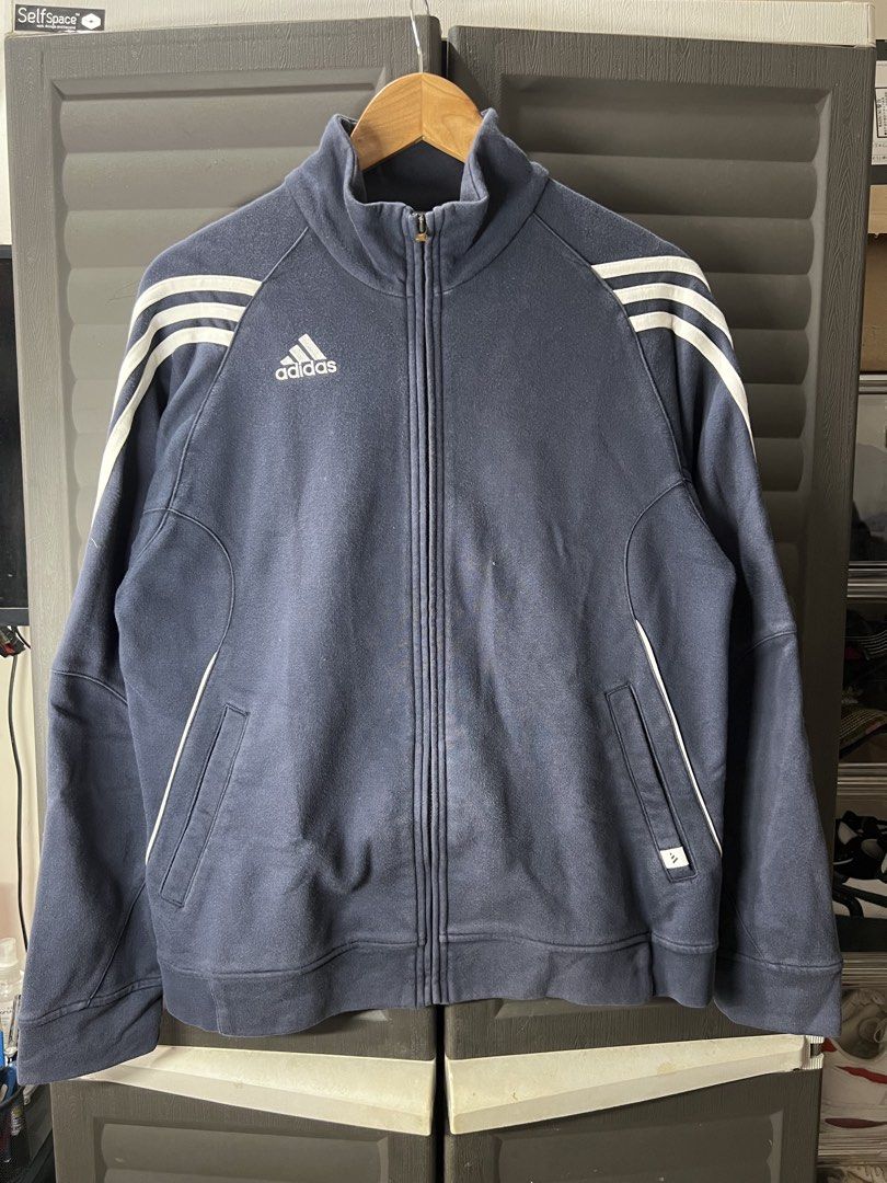 Vintage Adidas Navy Blue Track Jacket (Category: Coats, Jackets and Outerwear) located in Angono. Submitted by odd.fitt (Listing ID 1461984556, Image 1). Description: Large 175/96A 22W 27L Broken puller, working zip.