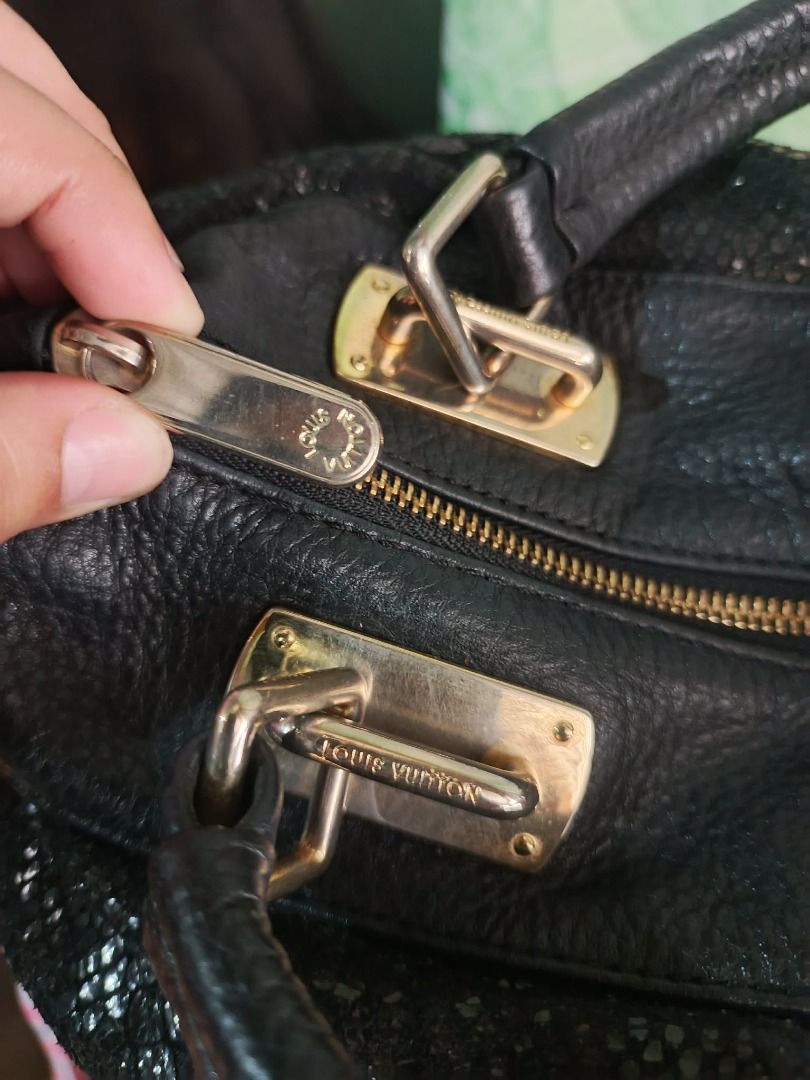 Vintage BLACK LV Handbag (Category: Luxury Bags & Wallets) located in Cagayan de Oro. Submitted by janeeh_007 (Listing ID 1461896120, Image 2). Description: -Black leather -Two rolled top handles -Gold/brass-tone hardware -Top central zipper -Two side compartments/pockets -Exterior small zip pockets -The distinctive Louis Vuitton “Inventeur – 101, avenue des Champs-Élysées, Paris” plaque.