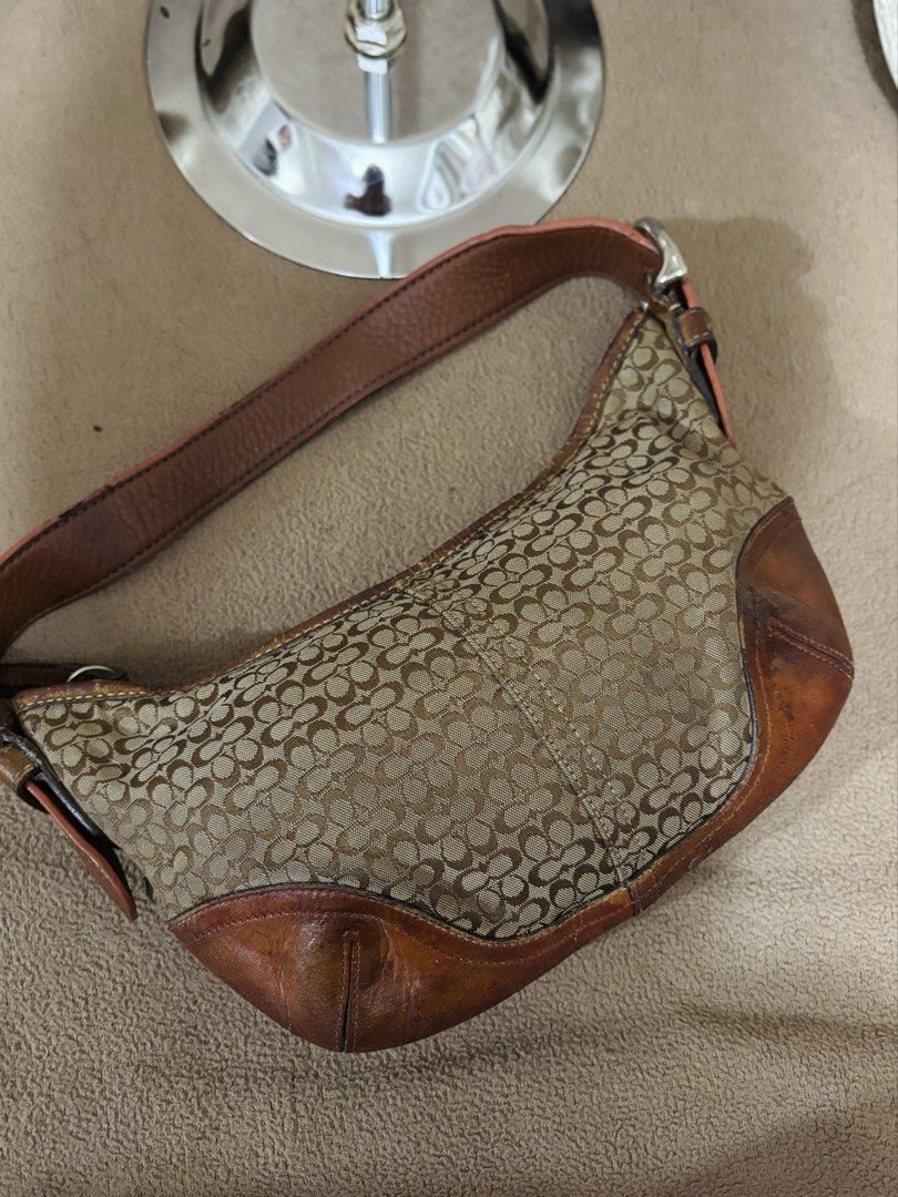 VINTAGE COACH (Category: Shoulder Bags) located in Taguig. Submitted by missjinjin (Listing ID 1461817742, Image 2). Description: Vintage Coach Soho Small Hobo Bag 📍NO COD Pm for more Details.