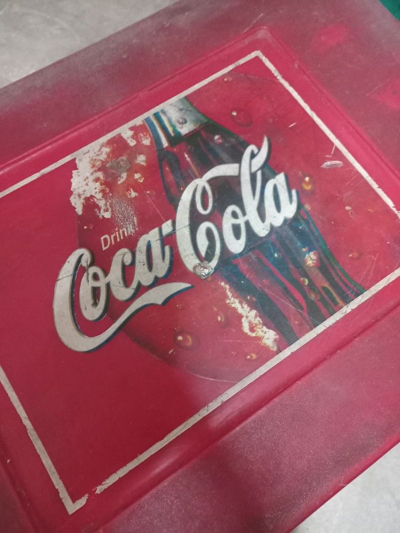 Vintage Coca-Cola Cooler Box Ice Chest (early 2000) (Category: Food Organization & Storage) located in Manila. Submitted by epicrabbit-968a (Listing ID 1461877019, Image 2). Description: - Classic red Coca-Cola cooler box - Ideal for parties and outdoor events - Fully functional for keeping drinks cold - Approximately 23 inches in length - A cool collectible for Coca-Cola enthusiasts.