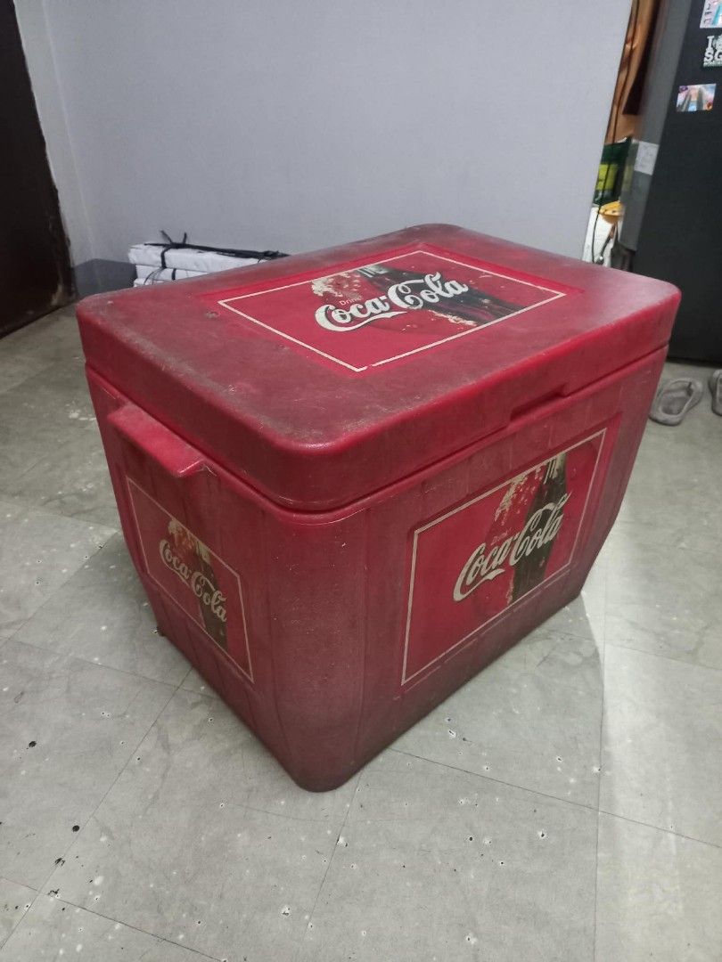 Vintage Coca-Cola Cooler Box Ice Chest (early 2000) (Category: Food Organization & Storage) located in Manila. Submitted by epicrabbit-968a (Listing ID 1461877019, Image 1). Description: - Classic red Coca-Cola cooler box - Ideal for parties and outdoor events - Fully functional for keeping drinks cold - Approximately 23 inches in length - A cool collectible for Coca-Cola enthusiasts.