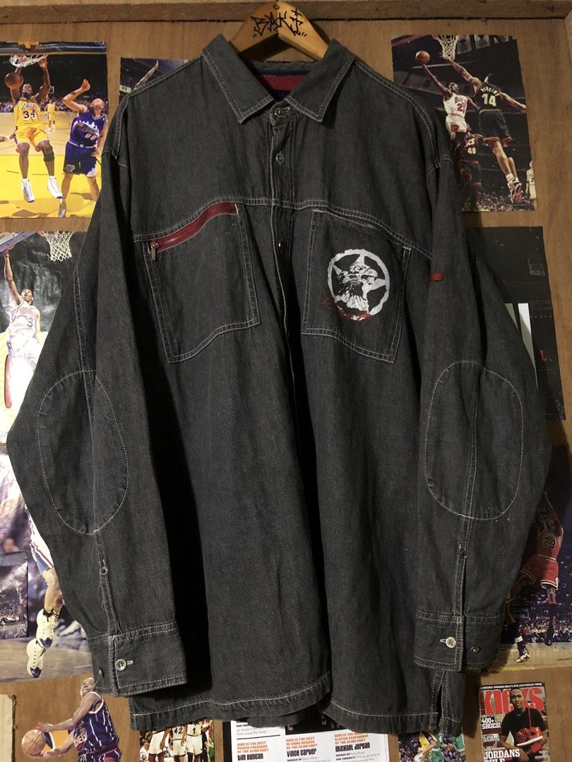 Vintage Dark Wash Denim Jacket with Graphic (Category: Coats, Jackets and Outerwear) located in Manila. Submitted by bakithrift213 (Listing ID 1461851079, Image 1). Description: - Cool dark wash denim jacket - Unique graphic on the chest - Zippered pocket on the left side - Button-up front with classic collar - Ideal for layering and streetwear looks.