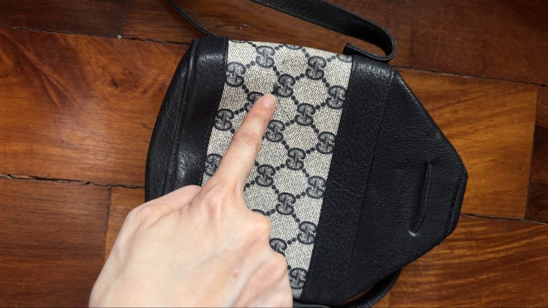 Vintage Gucci Monogram Shoulder Bag (Category: Luxury Bags & Wallets) located in Quezon City. Submitted by kb0030 (Listing ID 1461956155, Image 3). Description: - Classic Gucci shoulder bag - Iconic GG monogram canvas - Black leather trim - Secure drawstring closure - Soft interior lining - Adjustable leather strap - Timeless and versatile piece.