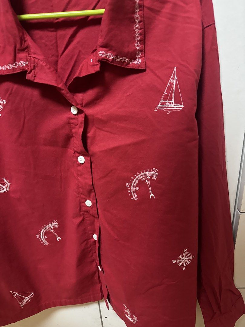 Vintage Red Nautical Print Button-Up Shirt (Category: Coats, Jackets and Outerwear) located in Manila. Submitted by quintessesommerset (Listing ID 1462026989, Image 3). Description: - Sophia Brooks red long-sleeved shirt 23x27.5 - Nautical print featuring compasses, sailboats, and anchors - Button-up front with white buttons - Unique chain-link embroidery detail on the collar - Ideal for a casual, preppy aesthetic.