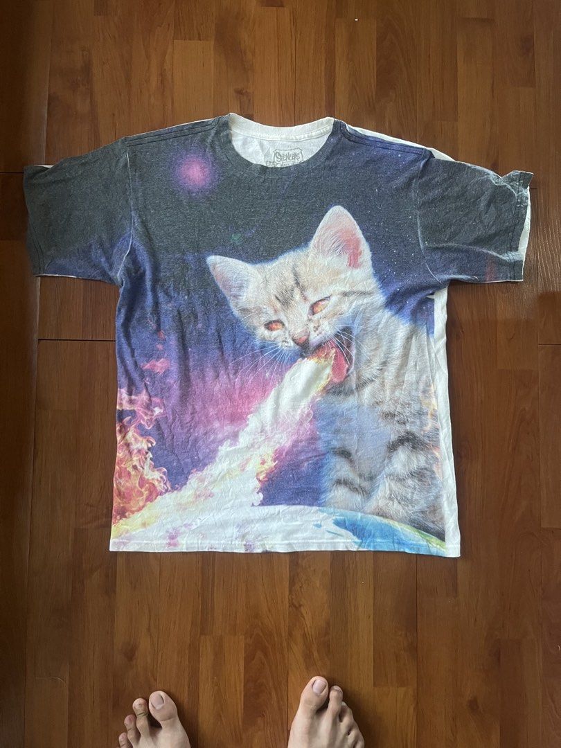 Vintage Spencer’s Fire Breathing Space Cat Graphic Tee (Medium) (Category: Tshirts & Polo Shirts ) located in Lipa City. Submitted by alexcollectionco (Listing ID 1461928654, Image 1). Description: Unleash chaotic space vibes with this vintage Spencer’s space cat graphic tee featuring a giant kitten breathing laser fire over Earth. Perfect for y2k, meme culture, synthwave, street style, and vintage graphic t-shirt lovers looking for a bold statem