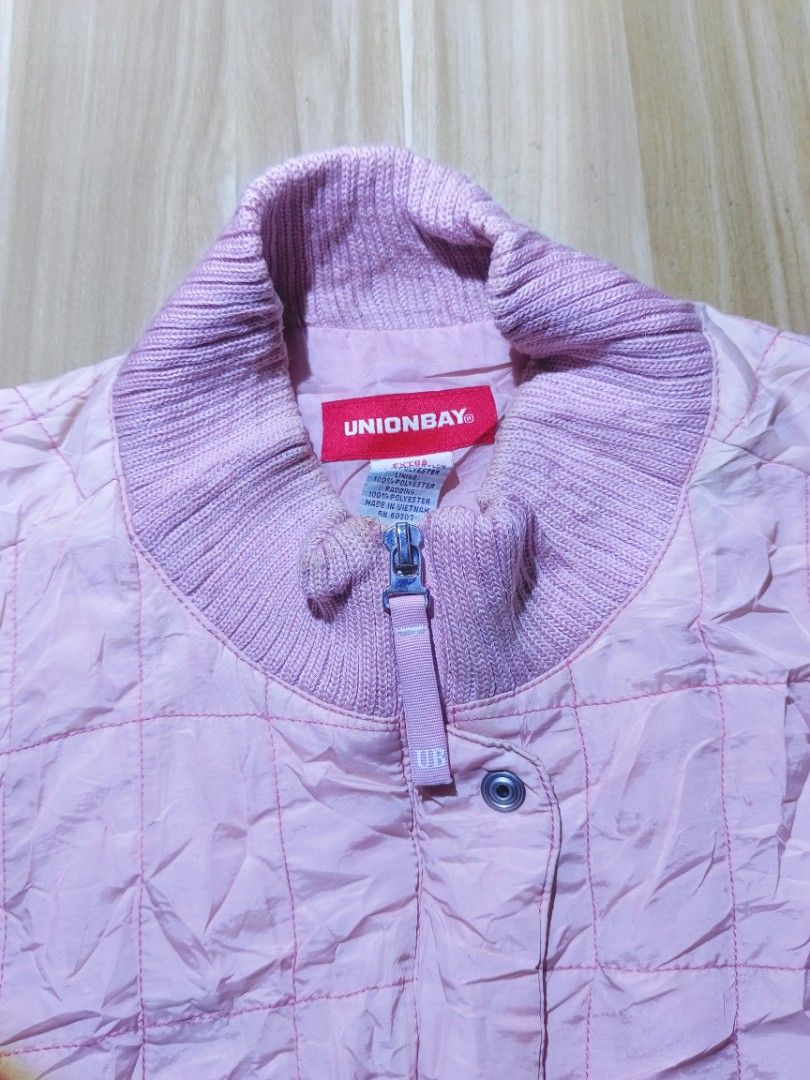 Vintage Unionbay Pink Quilted Bomber Jacket (Category: Coats, Jackets and Outerwear) located in Bayambang. Submitted by meowww1819 (Listing ID 1461955807, Image 3). Description: - Pink quilted bomber jacket - Brand: Unionbay - Stand-up collar - Zip-up front closure - Two front pockets with zippers - Ribbed cuffs and hem - Ideal for layering or light outerwear.