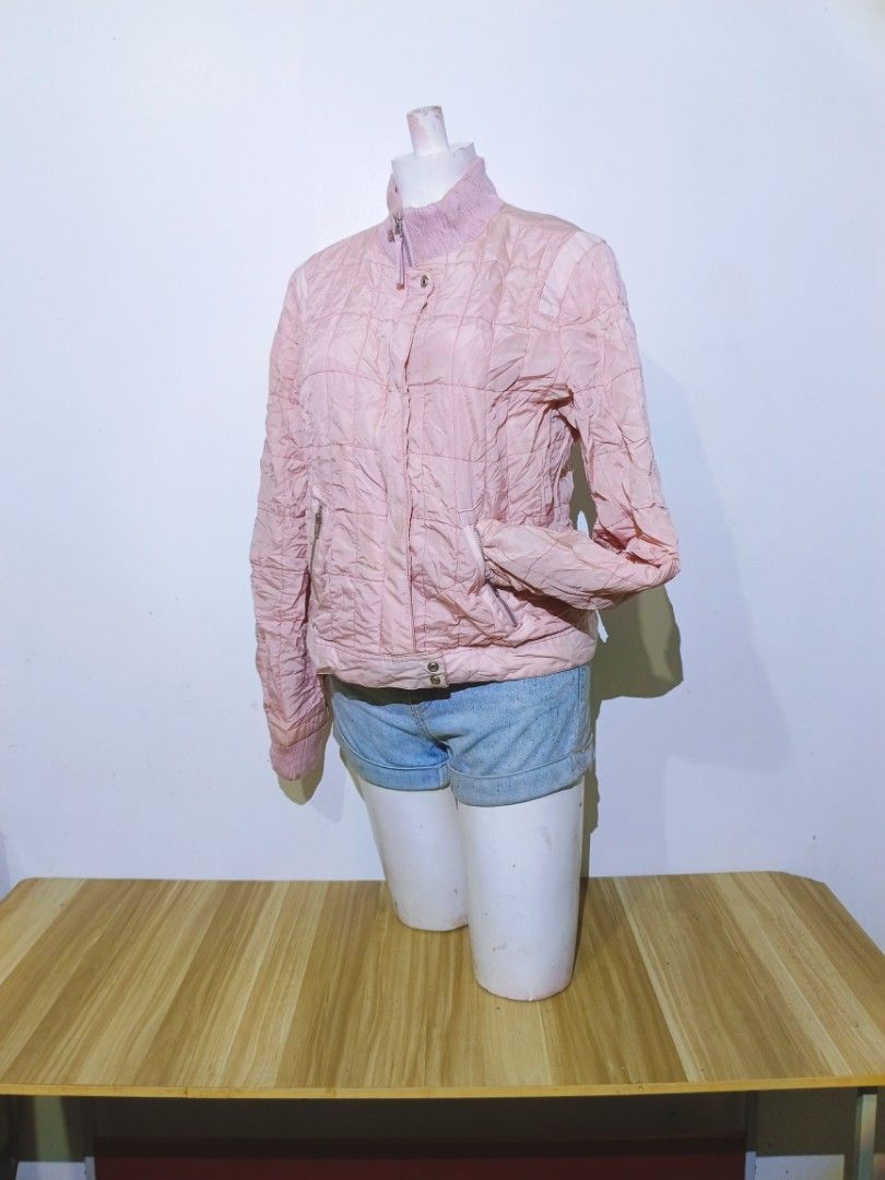 Vintage Unionbay Pink Quilted Bomber Jacket (Category: Coats, Jackets and Outerwear) located in Bayambang. Submitted by meowww1819 (Listing ID 1461955807, Image 2). Description: - Pink quilted bomber jacket - Brand: Unionbay - Stand-up collar - Zip-up front closure - Two front pockets with zippers - Ribbed cuffs and hem - Ideal for layering or light outerwear.