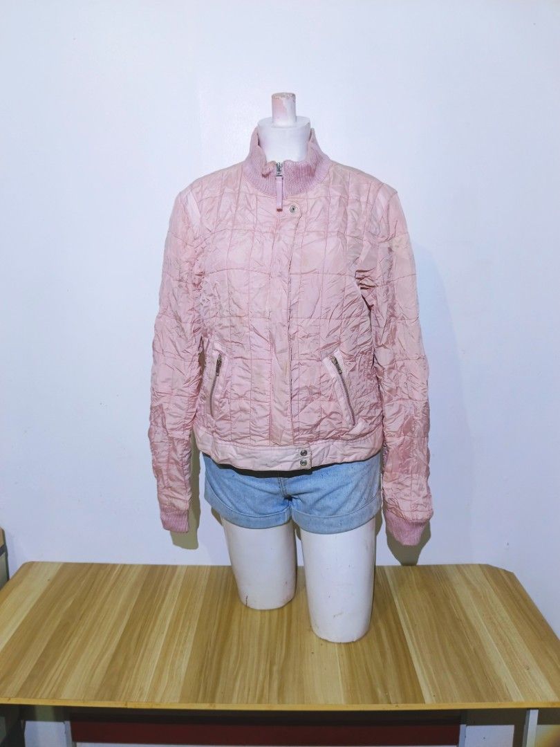 Vintage Unionbay Pink Quilted Bomber Jacket (Category: Coats, Jackets and Outerwear) located in Bayambang. Submitted by meowww1819 (Listing ID 1461955807, Image 1). Description: - Pink quilted bomber jacket - Brand: Unionbay - Stand-up collar - Zip-up front closure - Two front pockets with zippers - Ribbed cuffs and hem - Ideal for layering or light outerwear.
