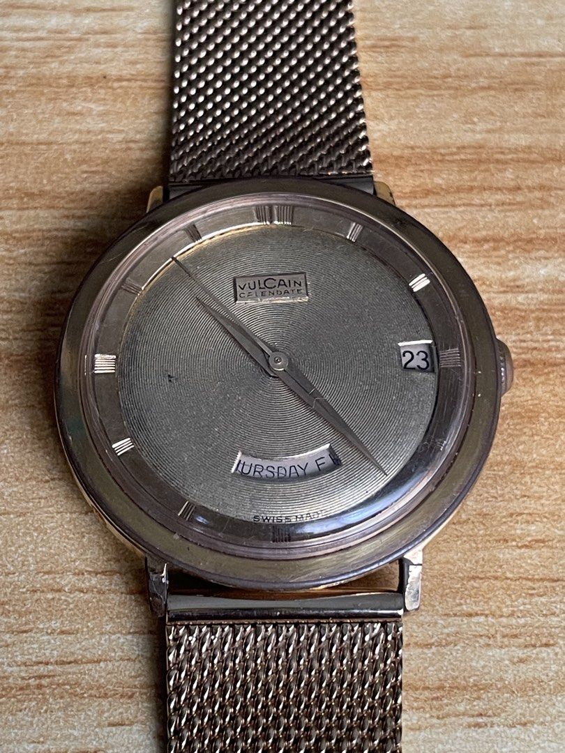 Vintage Vulcain Calendar (Category: Men's Watches) located in Taguig. Submitted by tester1x (Listing ID 1461816513, Image 2). Description: Vintage Vulcain Calendate Automatic 1960s Swiss Made 3355000 Gold color Dial Gold plated Bezel Stainless steel backcase 34mm Replacement Bracelet .