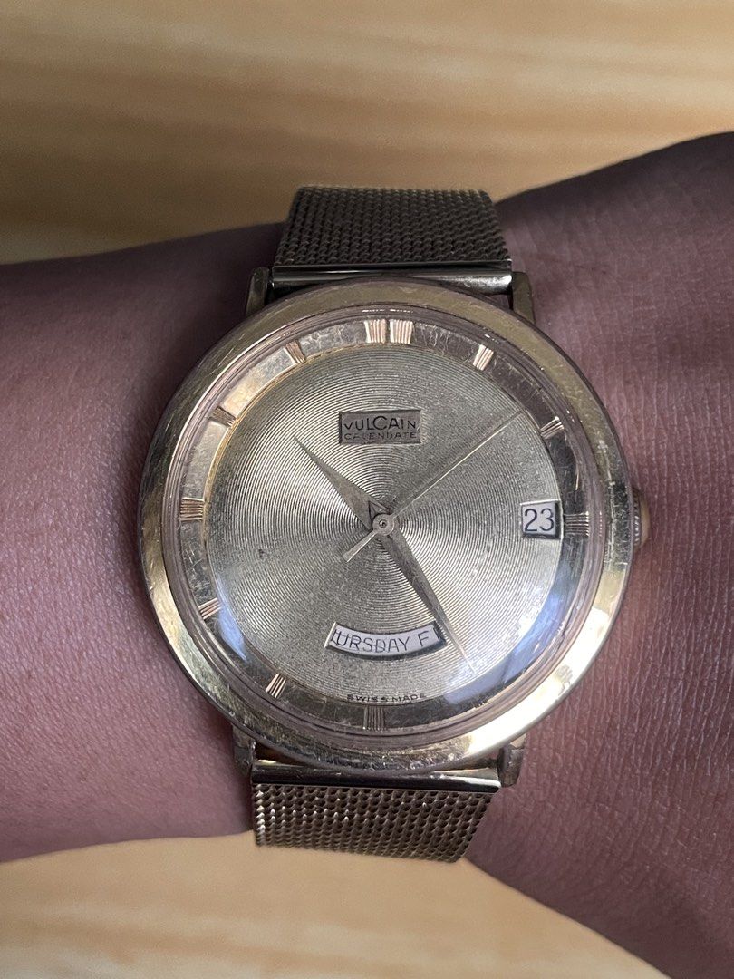 Vintage Vulcain Calendar (Category: Men's Watches) located in Taguig. Submitted by tester1x (Listing ID 1461816513, Image 1). Description: Vintage Vulcain Calendate Automatic 1960s Swiss Made 3355000 Gold color Dial Gold plated Bezel Stainless steel backcase 34mm Replacement Bracelet .