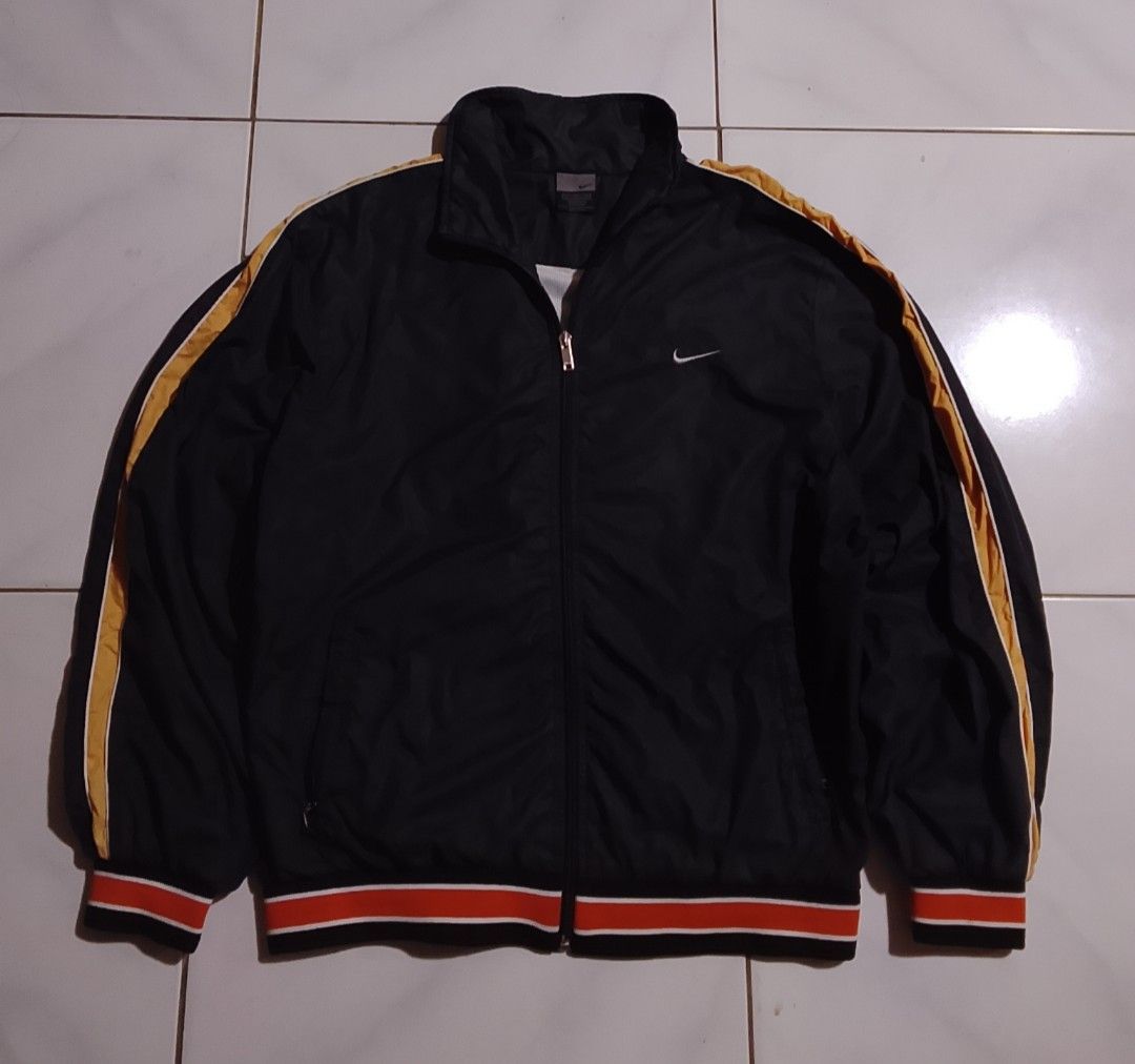 Vintage y2k Nike track jacket embroid (Category: Coats, Jackets and Outerwear) located in Manila. Submitted by steven.alex (Listing ID 1461841196, Image 1). Description: Vntg y2k Nike jacket embroid logo XL width "22" length "27" no issue bnew condi 10/10 cr.