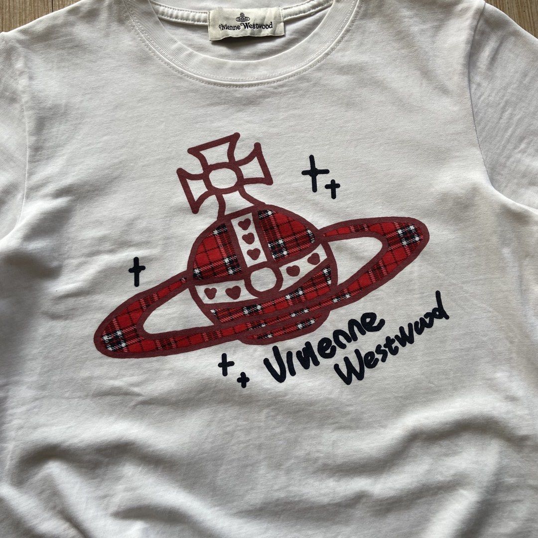 Vivienne Westwood Top (Category: Shirts) located in Legazpi City. Submitted by luxrystreet (Listing ID 1461828747, Image 3). Description: ▪️Vivienne Westwood Top ▪️WIDTH: 18.5 ▪️LENGTH: 21 ▪️COLOR RATE: 9/10 Or better ▪️IN VERY GOOD CONDITION ▪️COLOR MAY VARY DUE TO LIGHTING ▪️MANAGE YOUR EXPECTATIONS CAN PROVIDE OTHER PICTURES UPON REQUEST ISSUE(S): SEE LAST PIC NEED WASH.