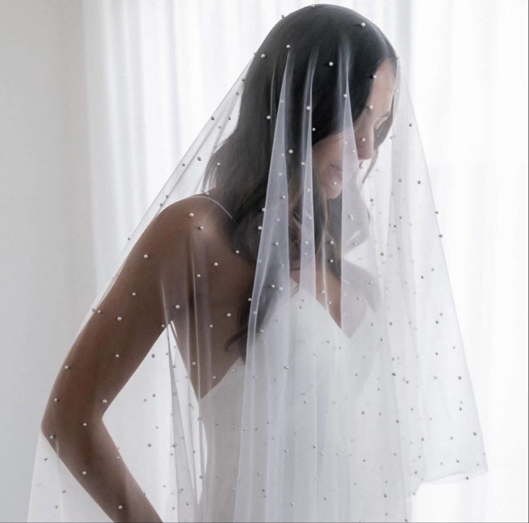 Wedding Bridal Veil with Pearls (Category: Hair Accessories) located in Manila. Submitted by jujufinds (Listing ID 1461443932, Image 2). Description: UNUSED Wedding Veil (3 meters long) White tulle with pearls Bought on orange app for P829 RFS: I opted for a longer one 📍Mandaluyong Shipping fee c/o buyer .