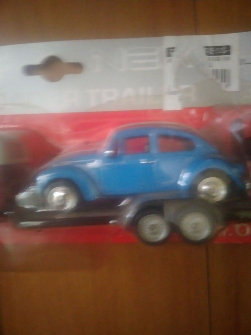 Welly Blue Car Trailer Toy (Category: Vehicle & Diecast Models) located in Manila. Submitted by howiebowie19_77 (Listing ID 1461831204, Image 3). Description: - Welly toy car and trailer set - Features a blue car with a white trailer - Brand new, still in original packaging - Ideal for toy car collectors - Great fun for kids who love cars pick up dito sa bahay or puwede niyo pa lalamove or grab kayo set sa address ko (buyers exp) display lang sa 
