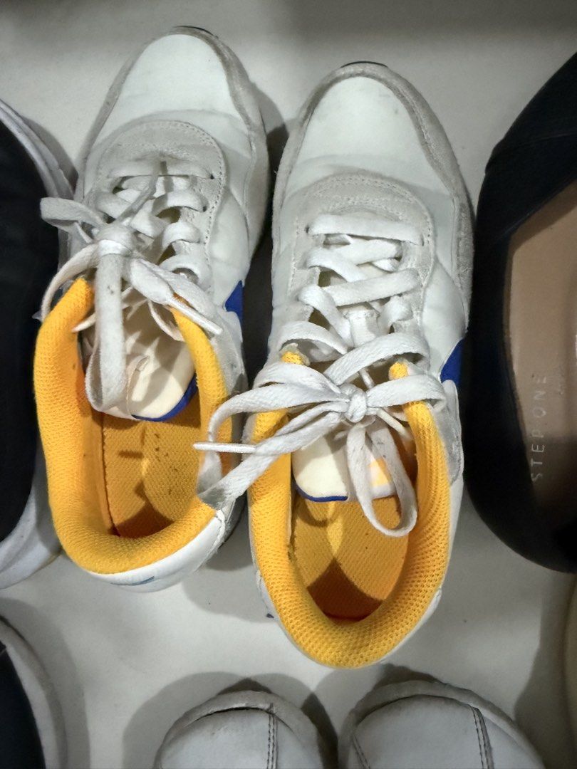 GS) Nike MD Valiant 'Summit White Racer Blue' (Category: Sneakers) located in Mabalacat. Submitted by .jellyfish_ (Listing ID 1461878608, Image 1). Description: - White sneakers with a pop of yellow inner lining and blue accents. - Classic white laces. - Designed for everyday comfort. - Perfect for your next adventure!.