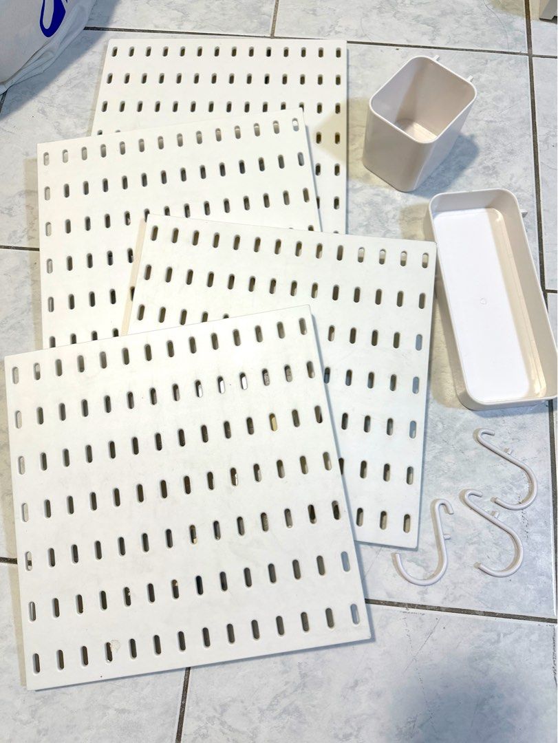 White Pegboard Organizer Panels with Accessories (Category: Home Improvement Tools & Accessories) located in Quezon City. Submitted by queerlady (Listing ID 1461909053, Image 1). Description: - White pegboard panels for versatile storage. - Perfect for organizing tools, crafts, and small items. - Comes with a detachable bin and tray. - Includes two S-hooks for hanging. - Easy to install and customize to your needs. Like new Need to replace adhesi