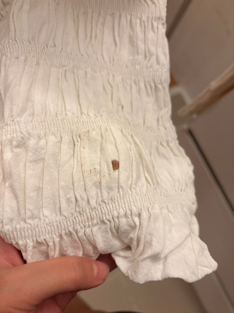 White Ruched Top (Category: Blouses) located in Mandaluyong City. Submitted by boopiefinds (Listing ID 1461977880, Image 2). Description: Has stain not sure if can be washed.
