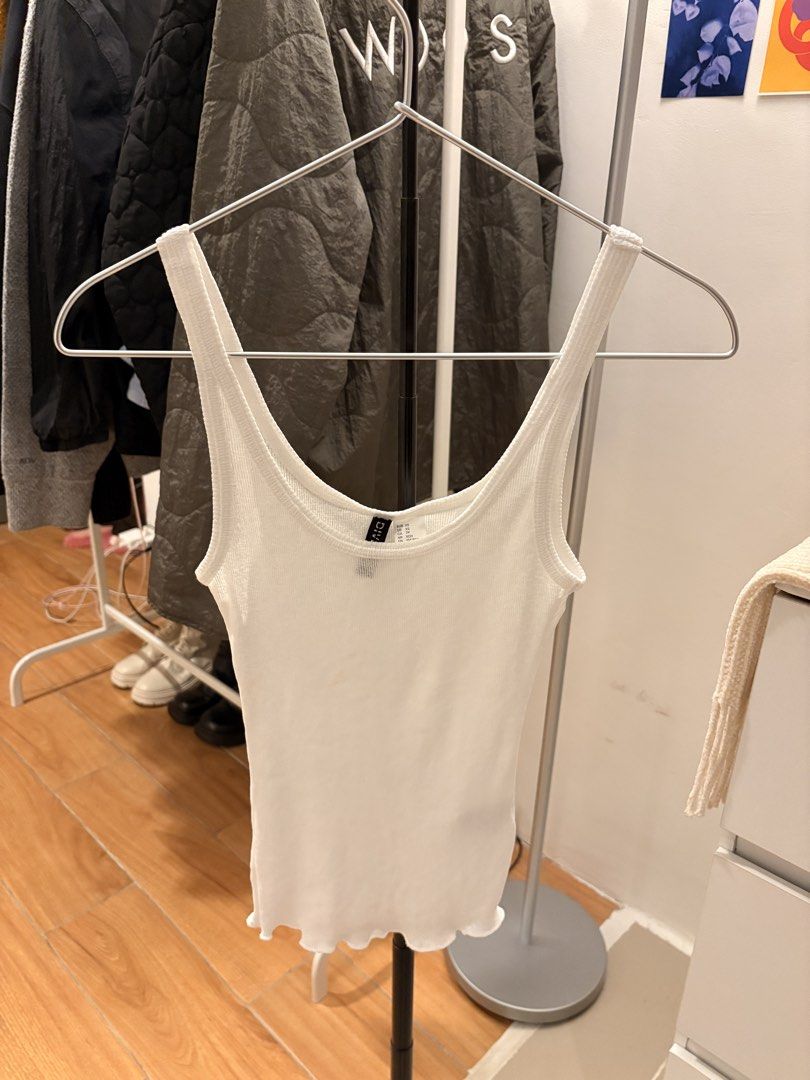 White Tank Top (Category: Sleeveless) located in Mandaluyong City. Submitted by boopiefinds (Listing ID 1461978049, Image 1). Description: Sheer mesh See through top.