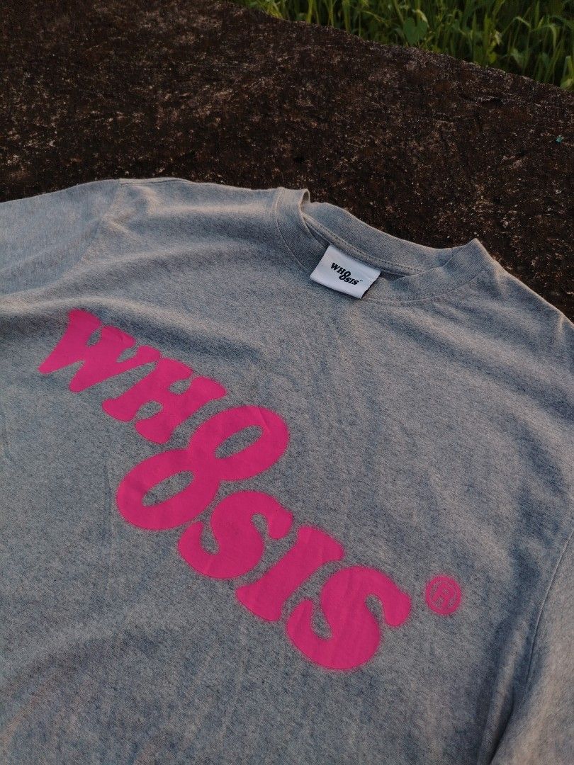 WHOOSIS Grey T-shirt with Pink Logo (Category: Tshirts & Polo Shirts ) located in Santa Maria. Submitted by vincellenard.-2 (Listing ID 1461908982, Image 2). Description: - Brand: WHOOSIS - Color: Grey - Design: Pink logo across chest - Material: 100% Cotton - Size/Dimensions: Width: 22 Length: 28.