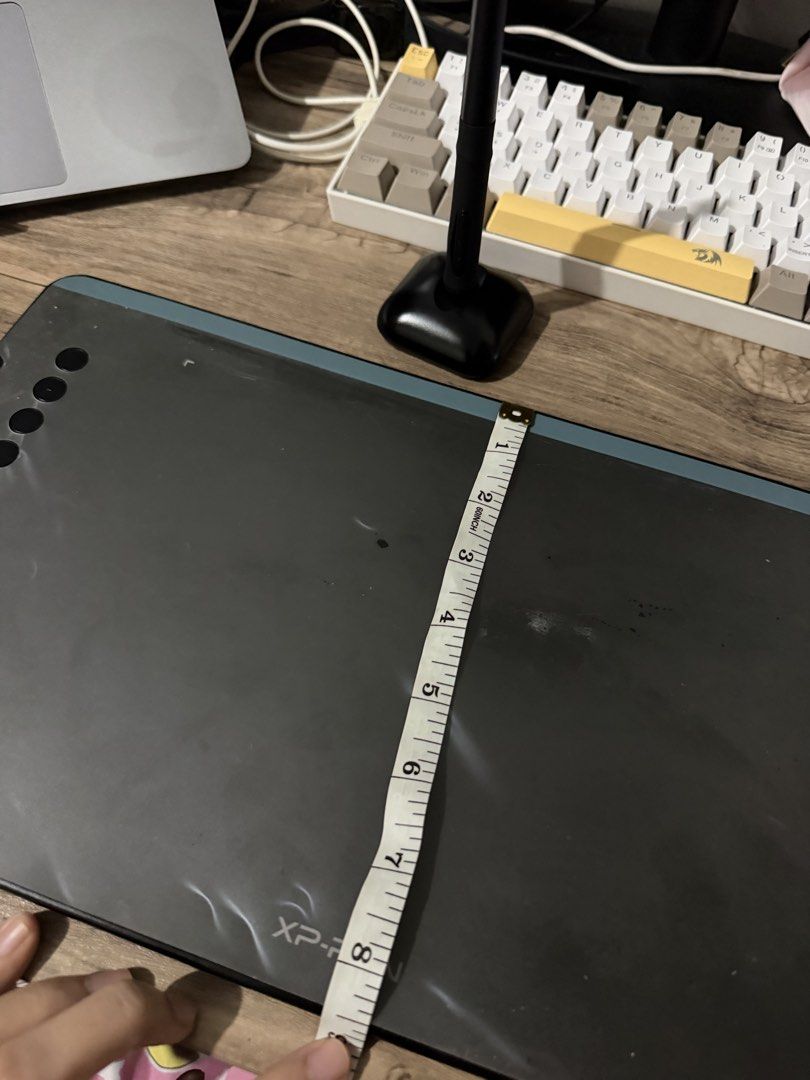 XPPen Deco 01 V2 Drawing Tablet (Category: Other Accessories) located in Quezon City. Submitted by bananak1tchen (Listing ID 1461937265, Image 2). Description: Have a lot of scratch marks as seen in photo. ONLY HAVE the tablet, pen, few nibs. DON’T HAVE the glove, other inserts etc. STILL WORKING, can send more video/photos SRP: 2-3k As is where is MOP: Gcash MOD: SDD/J&T.
