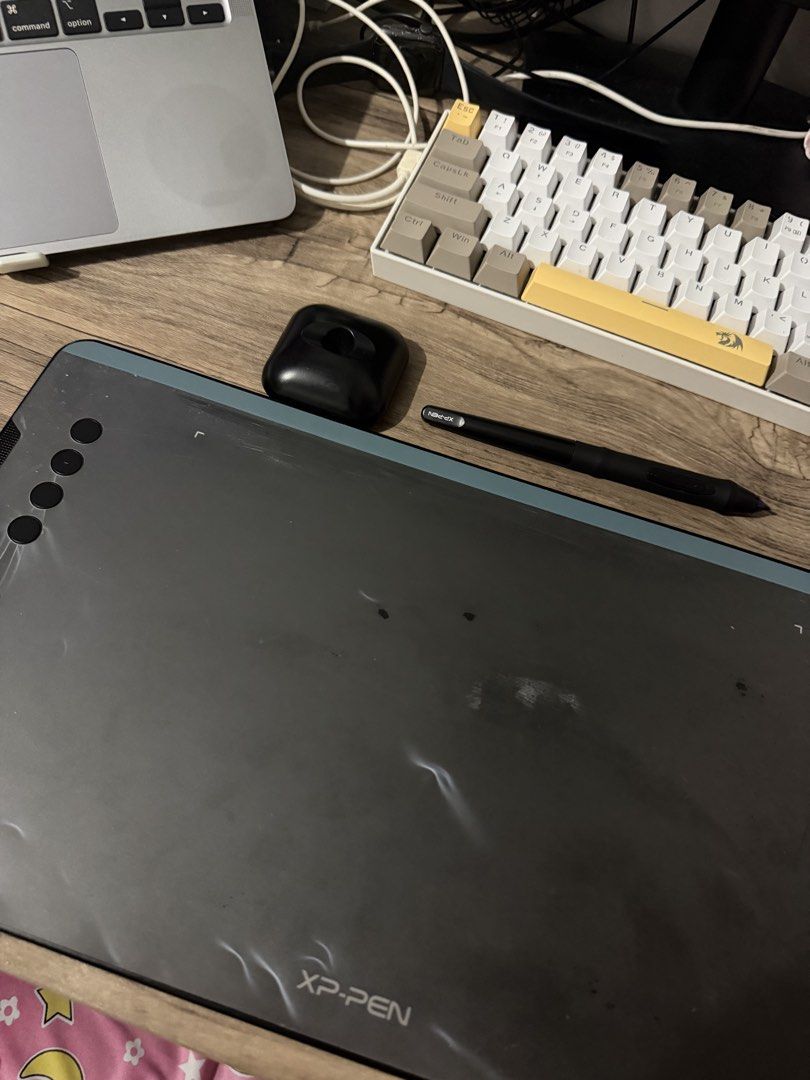 XPPen Deco 01 V2 Drawing Tablet (Category: Other Accessories) located in Quezon City. Submitted by bananak1tchen (Listing ID 1461937265, Image 1). Description: Have a lot of scratch marks as seen in photo. ONLY HAVE the tablet, pen, few nibs. DON’T HAVE the glove, other inserts etc. STILL WORKING, can send more video/photos SRP: 2-3k As is where is MOP: Gcash MOD: SDD/J&T.
