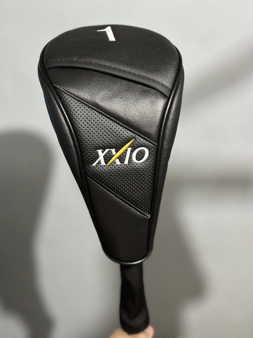 XXIO Golf Driver Headcover - Black (Category: Golf) located in Manila. Submitted by cnmanaois19234 (Listing ID 1461880150, Image 2). Description: - Black XXIO driver headcover - Features the number '1' on top - Perforated texture detail on the front - Provides excellent club protection - Ideal for any XXIO fan.