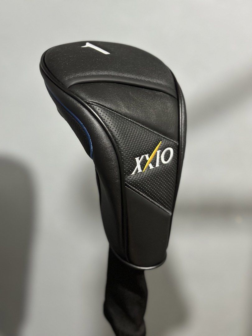 XXIO Golf Driver Headcover - Black (Category: Golf) located in Manila. Submitted by cnmanaois19234 (Listing ID 1461880150, Image 1). Description: - Black XXIO driver headcover - Features the number '1' on top - Perforated texture detail on the front - Provides excellent club protection - Ideal for any XXIO fan.