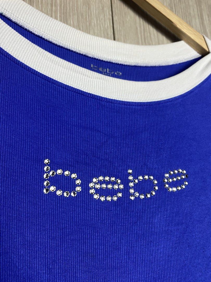Y2K BEBE STUDDED TOP (Category: Blouses) located in Marikina City. Submitted by ilayastreetarchives_ (Listing ID 1461856918, Image 3). Description: Y2K BEBE STUDDED TOP Size Tagged: Medium Width/Waist: 15 Length: 25 Condition: 9/10 (good) Issues: None Color rate: 9/10 M/Mine: 380 PHP.