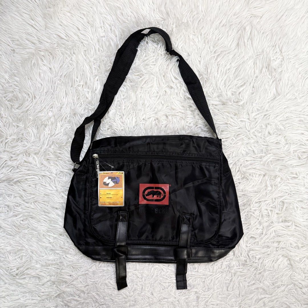 Y2k ecko (Category: Sling Bags) located in Baguio. Submitted by sellingtonshop (Listing ID 1461848815, Image 1). Description: r50. Marc Ecko messenger bag Dimes: 17L 12W Condition: excellent Issue: none 15 pieces available 380 each .