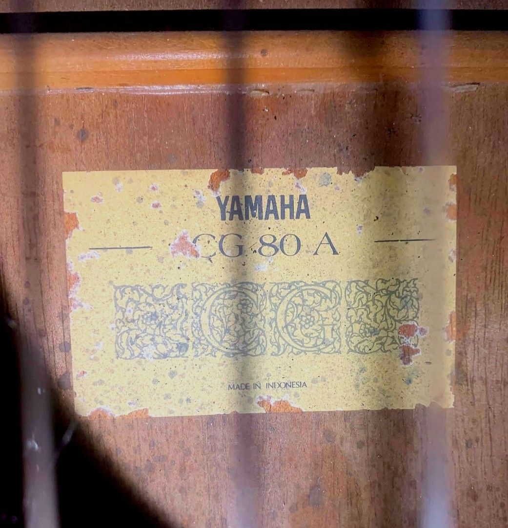 Yamaha CG-80 A Classical Guitar (Category: Musical Instruments) located in Manila. Submitted by nicszz (Listing ID 1461896604, Image 2). Description: Yamaha CG80A Model: CG80A Issue: dents, also please verify the condition/appearance of guitar based on the picture All parts of guitar are posted for your reference No rusts/Walang kalawang sa pegs Need palitan string Low action This is original, not a copy Loc: north camarin caloocan For pickup or 