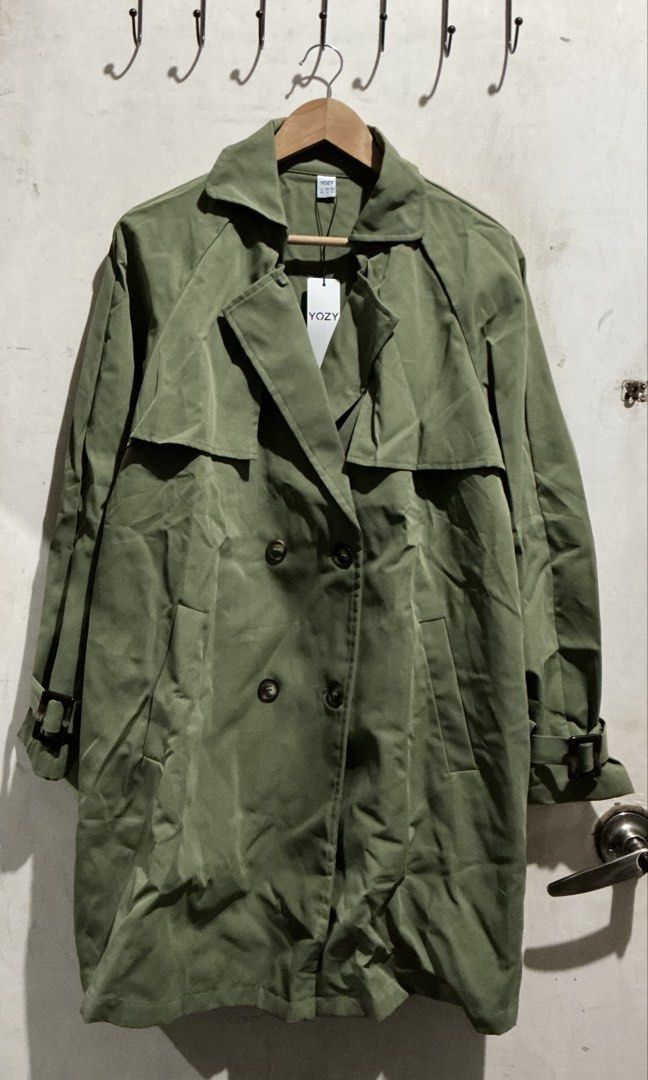 YOZY TRENCH COAT (Category: Coats, Jackets and Outerwear) located in Dagupan City. Submitted by trendies_collection (Listing ID 1462007639, Image 1). Description: Brand new with pouch and hang tag Large on tag With belt and belt slot, same sa sleeves No issue.