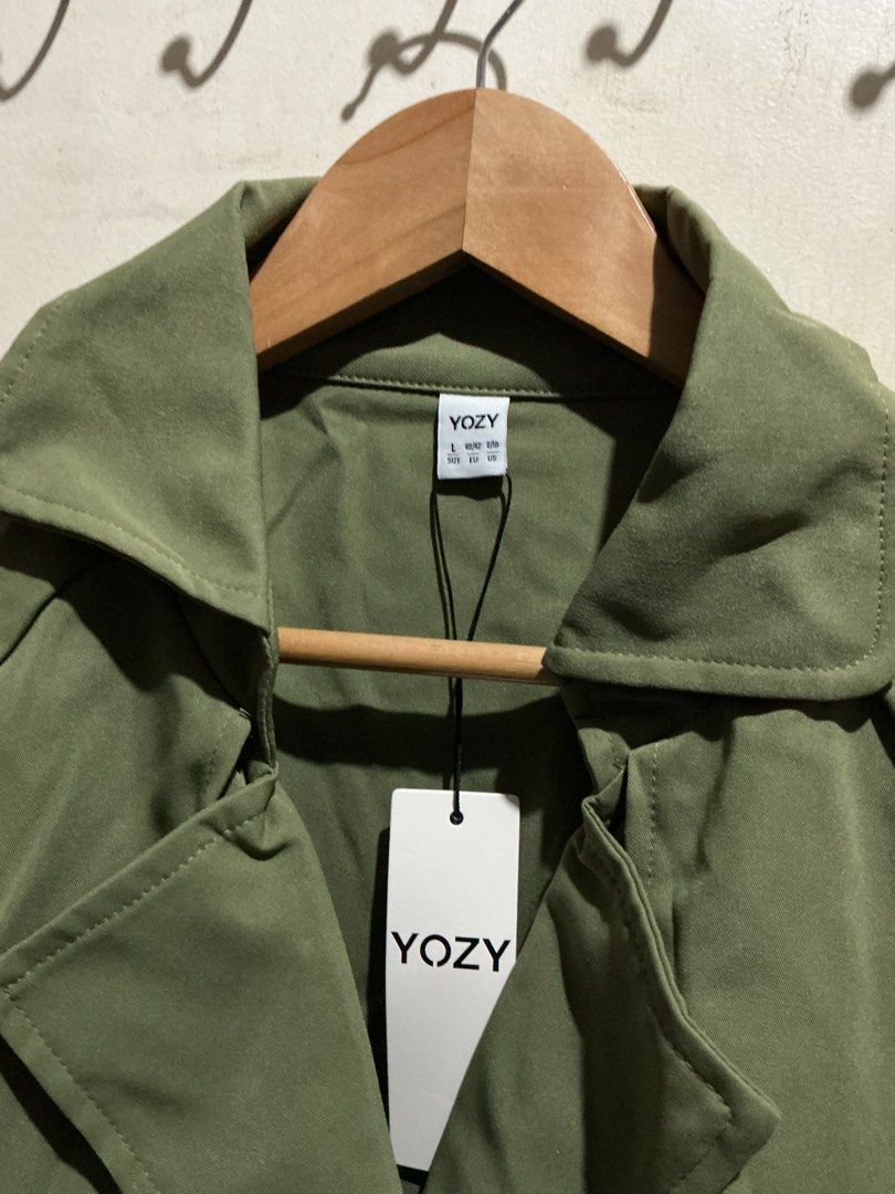 YOZY TRENCH COAT (Category: Coats, Jackets and Outerwear) located in Dagupan City. Submitted by trendies_collection (Listing ID 1462007639, Image 3). Description: Brand new with pouch and hang tag Large on tag With belt and belt slot, same sa sleeves No issue.