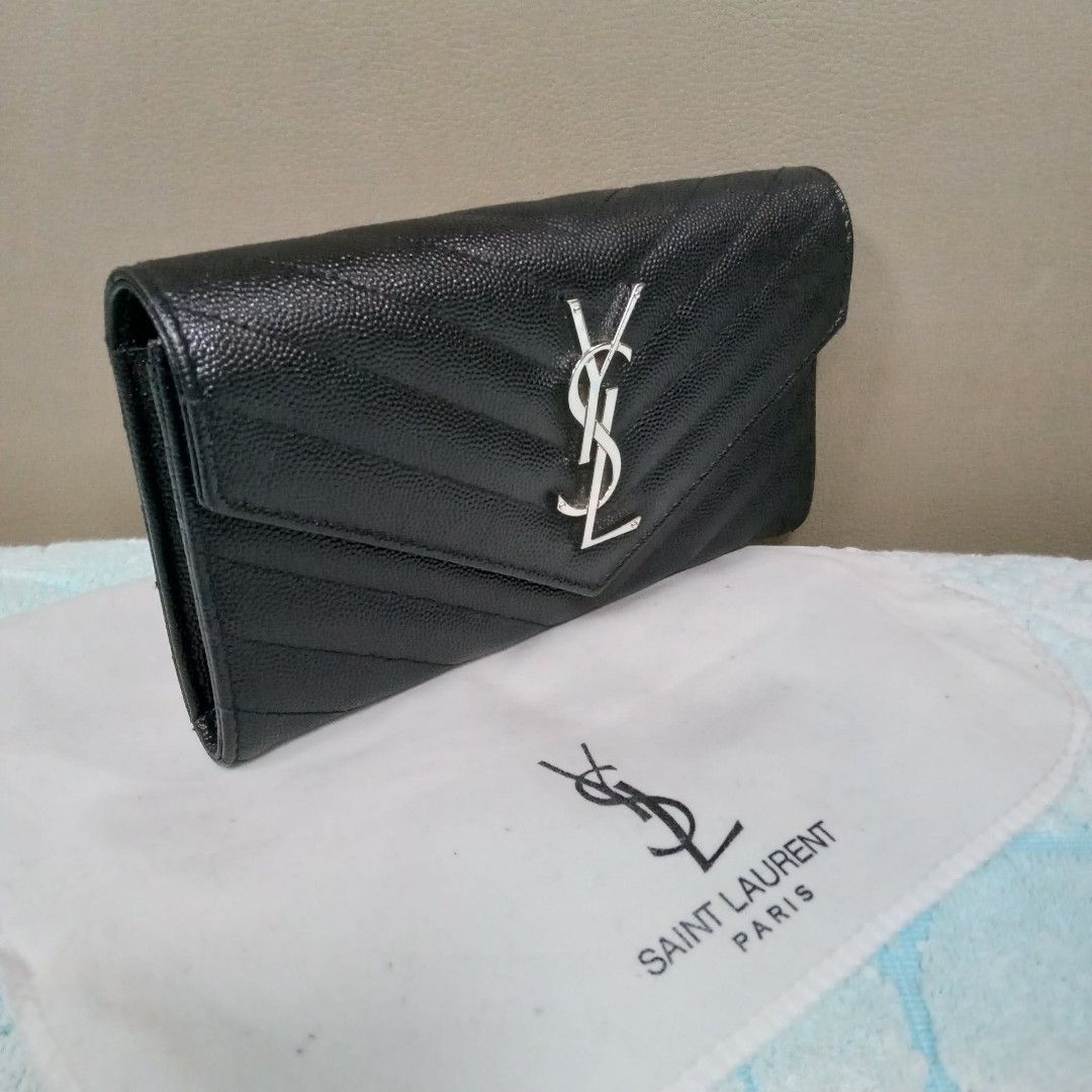 YSL Long Wallet (Category: Luxury Bags & Wallets) located in Taguig. Submitted by esa.agustin (Listing ID 1461810403, Image 2). Description: Original YSL leather black long envelope type wallet. Made in Italy..