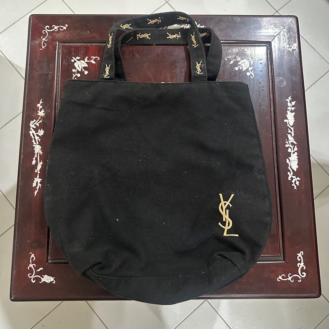 Yves Saint Laurent (YSL) Authentic Tote Bag (Category: Luxury Bags & Wallets) located in General Santos City (Dadiangas). Submitted by rumrmdna (Listing ID 1461869616, Image 1). Description: YSL Authentic Tote Bag No issues, all in good or better condition Pink interior Gold Embroidered Logo Price is Negotiable! RFS: need funds.