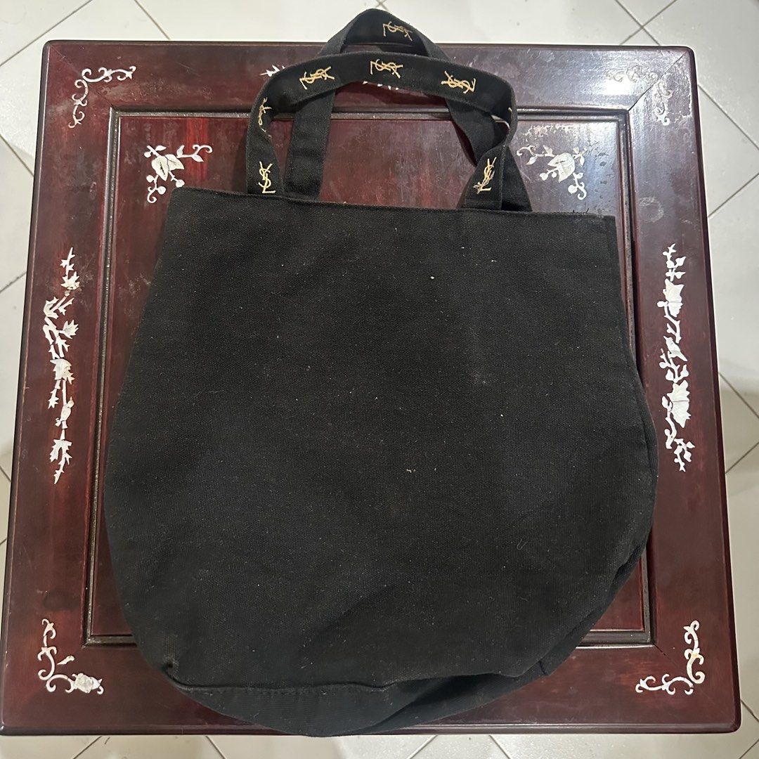 Yves Saint Laurent (YSL) Authentic Tote Bag (Category: Luxury Bags & Wallets) located in General Santos City (Dadiangas). Submitted by rumrmdna (Listing ID 1461869616, Image 2). Description: YSL Authentic Tote Bag No issues, all in good or better condition Pink interior Gold Embroidered Logo Price is Negotiable! RFS: need funds.
