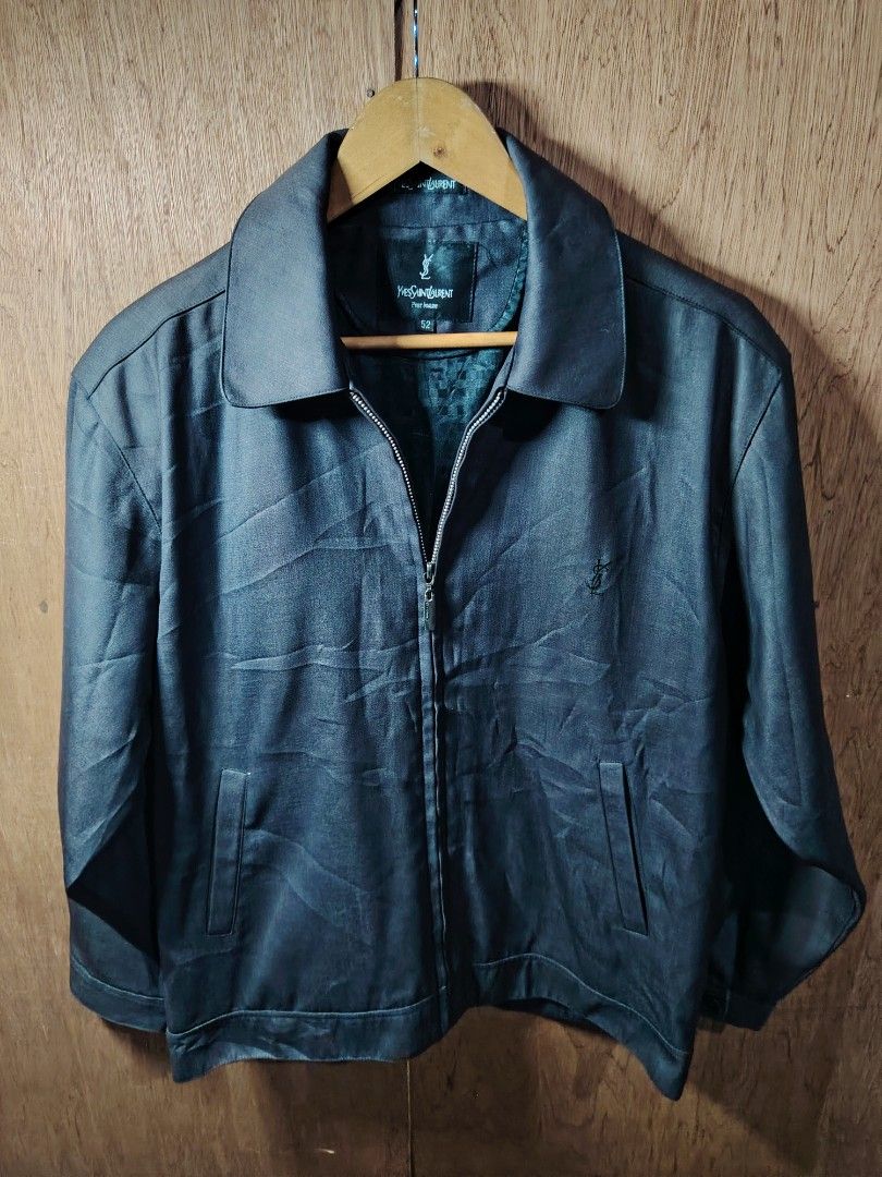 Yves Saint Laurent YSL Bomber Jacket Size 52 (Category: Coats, Jackets and Outerwear) located in Baguio. Submitted by angeloshoppebaguio2600 (Listing ID 1461980033, Image 1). Description: - Classic Yves Saint Laurent jacket - Features iconic YSL logo embroidered on chest - Zip-up front with pockets - Size: 52 - Inner lining has damage near pocket area (refer to last photo for details) color rate niya nasa 8/10 pa po .