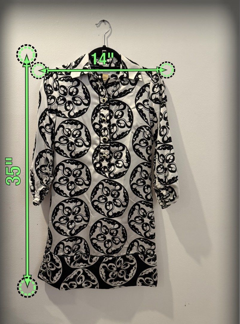 ZARA BASIC Black & White Print Shirt Dress (Category: Dresses) located in Makati City. Submitted by jcalmartz (Listing ID 1461813003, Image 2). Description: - Brand: ZARA BASIC - Style: Print Shirt Dress - Color: Black and White - Material: 100% Polyester - Neckline: Collared - Closure: Button-up front - Sleeves: 3/4 length with elastic cuffs - Measurements: 35 inches (length), 14 inches (pit to pit) - Versatility: Perfect for casual or dressed-u