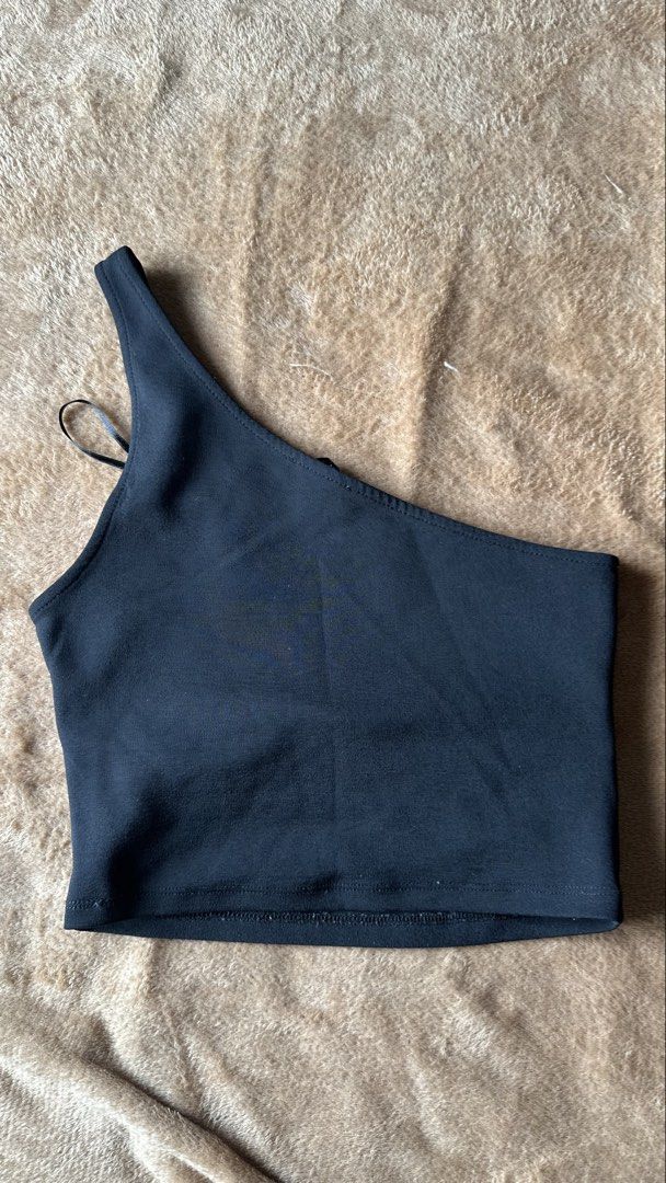 Zara Black One Shoulder Ruched Crop Top (Category: Sleeveless) located in Mandaluyong City. Submitted by yv.stuff (Listing ID 1461833499, Image 3). Description: - Zara black one-shoulder crop top - Features flattering ruching detail across the front - Simple yet chic design - Perfect for dressing up or down - Easily pairs with skirts or pants.