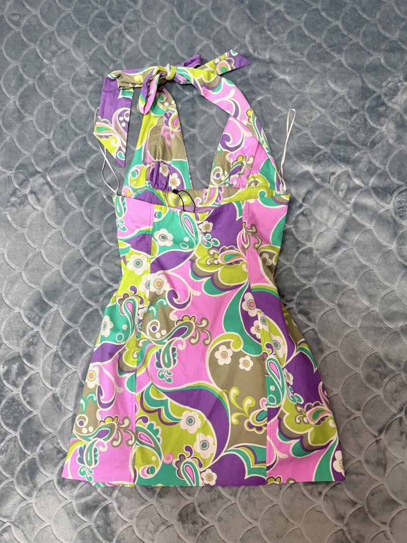 Zara Halter Neck Mini Dress Psychedelic Print (Category: Dresses) located in Tarlac. Submitted by kylienclrzbl (Listing ID 1461916379, Image 2). Description: - Funky Zara halter neck mini dress - Vibrant psychedelic print (pink, purple, green, brown) - Ties at the neck - Perfect for summer parties or a retro look - Made in Morocco - Used Once -Size SMALL TO MEDIUM.