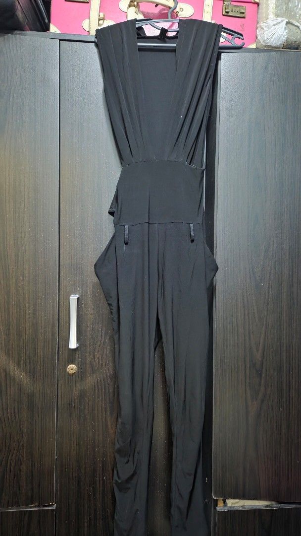 Ziyistorm Black Draped Jumpsuit (Category: Jumpsuits) located in Quezon City. Submitted by kctheexplorer05 (Listing ID 1461933125, Image 1). Description: - Chic black jumpsuit - Draped front design - Soft and flowy material - Perfect for dressing up or down - Comfortable for all-day wear - Pairs well with heels or flats.